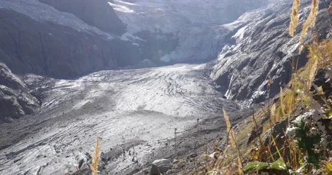 Glacier and rocks in the mountains in Dombay Stock Footage 144931994