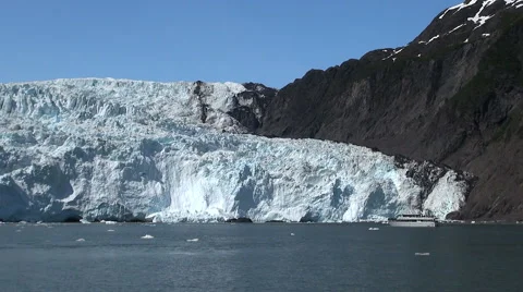 Glacier and a tourist boat - Kenai fjords, Alaska Stock Footage