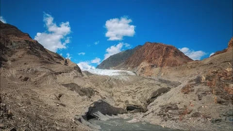Glacier covered with rocks in the mountains Stock Footage 155233138