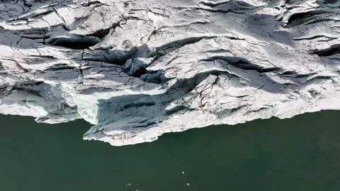 Glacier Edge Aerial View 4k Drone Footage Melting Ice Sheet Ocean Water Stock Footage 338264890
