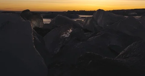 Glacier floating in the sea at sunset Video stock 103810678