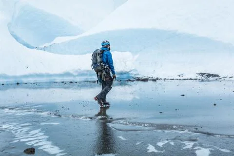 Glacier guide exploring the Matanuska Glacier in the rain. Stock Photos