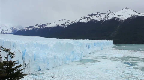 Glacier Ice Breaking Off and Falling Stock Footage 45616086