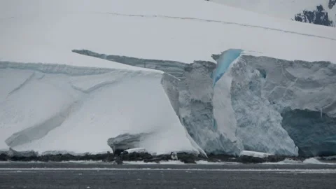 Glacier ice cliff blue ice detail Antarctica, 4K Stock Footage 332393622