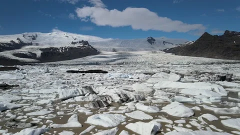 Glacier lagoon with melting icebergs Stock Footage