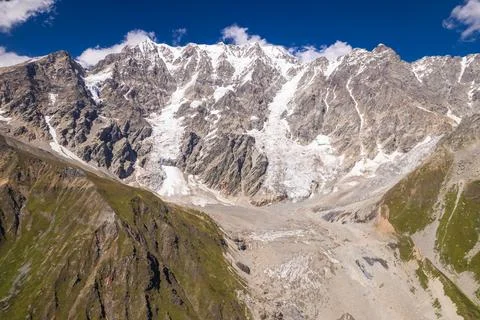Glacier with mountain backdrop Stock Photos