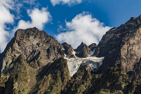 Glacier in the mountains of North Ossetia. Sharp peaks of the North Caucasus  Stock Photos
