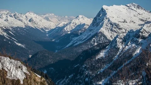 Glacier. Shadows slide along the mountain peaks at sunset Stock Footage 83694641