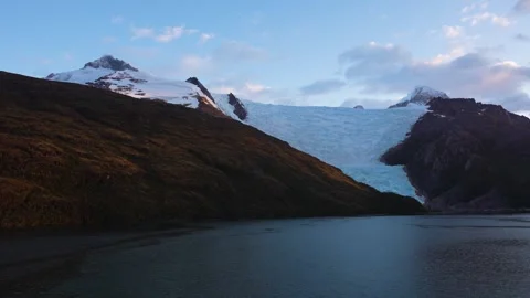 Glacier in Strait of Magellan Cruising Past Beautiful Sunset Warm Light Ant.. Stock Footage 277920196