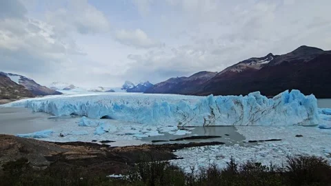 Glacier Terminus With Ice Rubble Below Dark Mountain, Argentina 4K Stock Footage 306469832