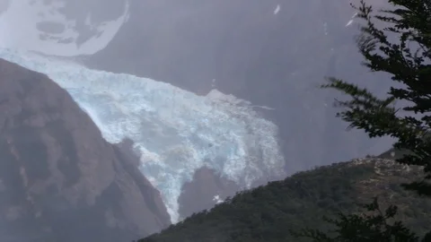 Glacier view in a bad weather (wind, rain drops, shaky). Stock Footage 103261343