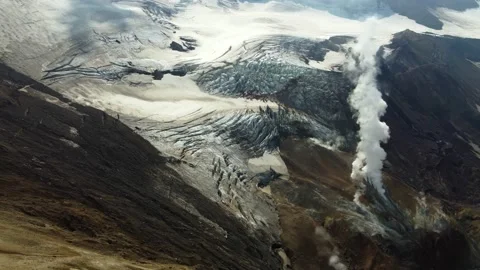Glacier in a volcano with smoke Stock Footage 167813036