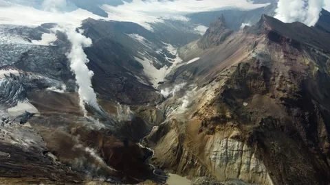 Glacier in a volcano with smoke Stock Footage 167813098