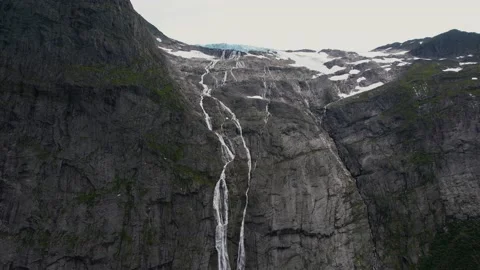 Glacier waterfall running down over the mountain Video stock 232865069