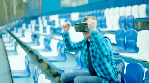 Glad guy supporting his team at the stadium Stock Footage 63555660
