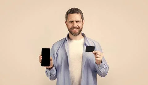 Glad man paying transaction in studio. man paying transaction. Foto stock