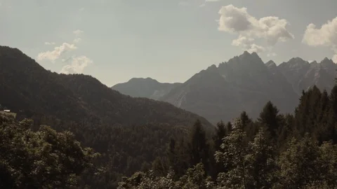 Glade with mountains in the background Stock Footage 92018711