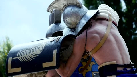 Gladiator warriors fighting against each other. Shot in slow motion on red Epic. Stock Footage 41816445