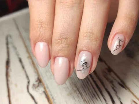 Glamorous beautiful manicure on a trendy texture Stock Photos