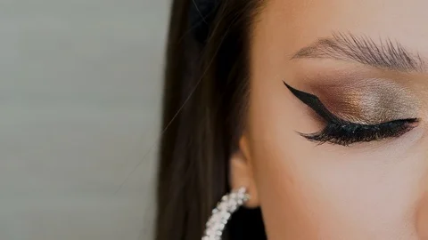Glamorous bright eye makeup, women's eyes close-up. Stock Footage 124524809