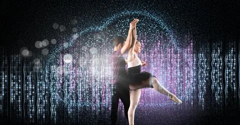 Glamorous Couple dancing with digital technology interface and glowing sparkling 스톡 사진