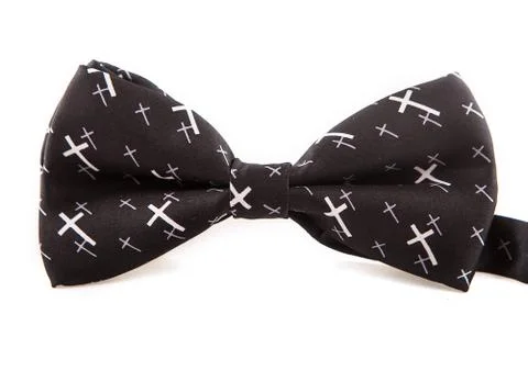 Glamorous elegant accessory bow tie black with white crosses on isolated white 库存照片