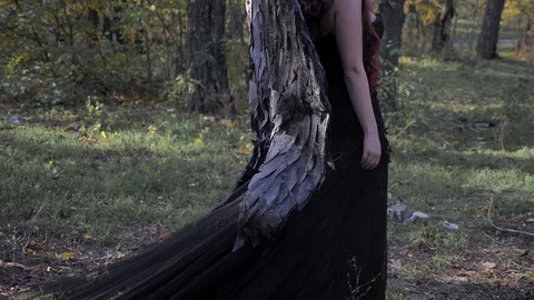 Glamorous female walking in the forest in slow mo Stock Footage 128588564