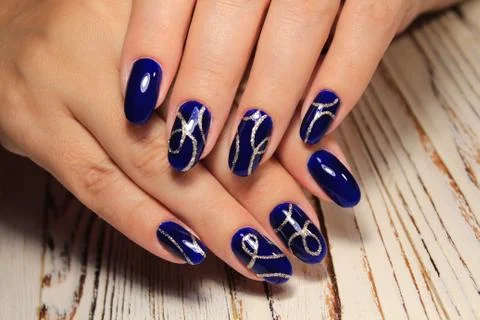 Glamorous manicure of nails Stock Photos