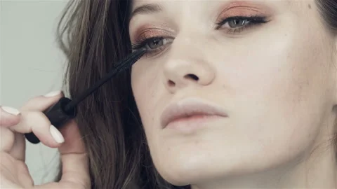 Glamorous narcissistic girl does herself a make-up. Stock Footage 120793653