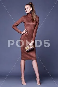 Glamour fashion woman long brunette hair natural evening makeup wear sexy ski Stock Photos