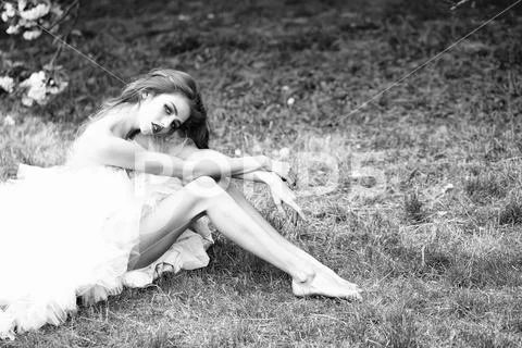 Glamour woman on green grass Stock Photos