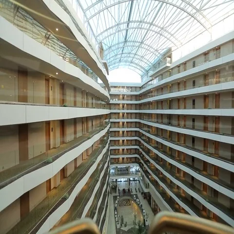 Glance trough the transparent glass elevator moving down Stock Footage 69529221