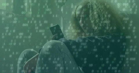 Glancing woman in knit sweater checking smartphone on floor by window, binary Stock Footage 334185264
