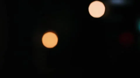Glare and light of a lamp in a black room Stock Footage 130232115