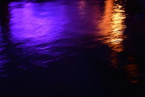 Glare and reflection of light on the water. Stock Photos