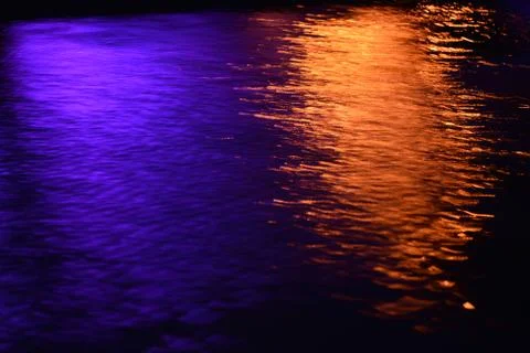 Glare and reflection of light on the water. Stock Photos