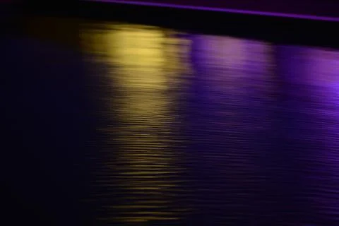 Glare and reflection of light on the water. Stock Photos