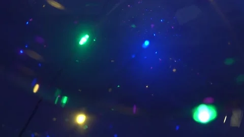 Glare in the form of an unidentified flying object slowly flying up Stock Footage 146783254