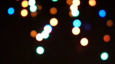 Glare from the garland out of focus Vídeo Stock 77405407