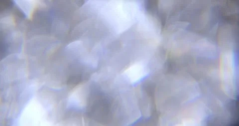 Glare of light in the lens on a black background Video stock 289178308