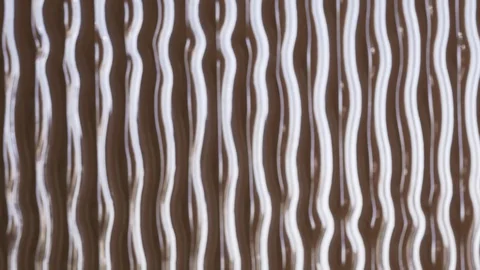 Glare of light moves along the surface texture. Volumetric texture waves on a Stock Footage 128183007