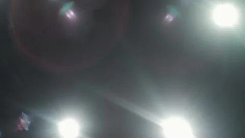 Glare from the spotlight under the dome of the circus. Stock Footage 168373554