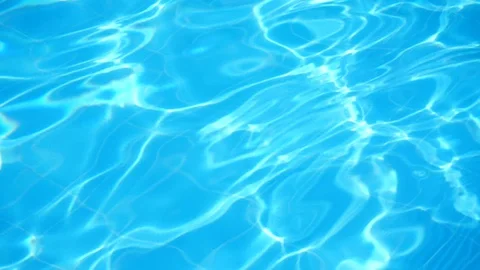 Glare from the sun on the water in the pool. Stock Footage 128080320