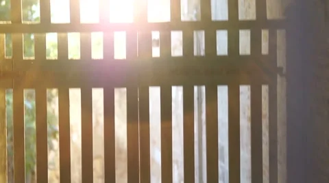 Glare of sunlight through bars  ancient gates Stock Footage 42470568