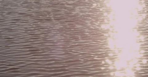 Glare on the water from the sun Stock Footage 75310741