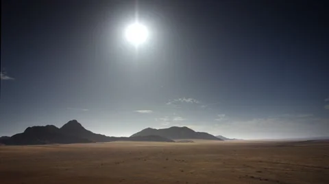GLARING SUN OVER VAST AFRICAN PLAIN UHD 4K Stock Footage 45342210