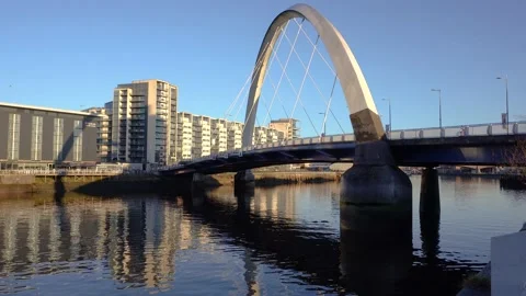 Glasgow Arc bridge crossing the River Clyde, Scotland, UK Stock Footage 228930861