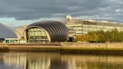 Glasgow Science Centre at Pacific Quay Waterfront at sunset in Scotland Stock Footage 213360091