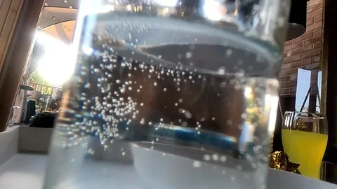 Glass alcohol bubbles slow motion Stock Footage 151636745