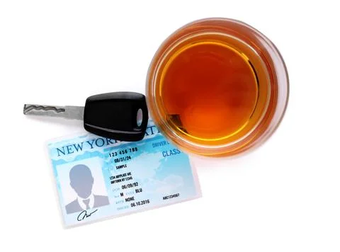 Glass of alcohol, car key and driver license on white background, top view. R Stock Photos